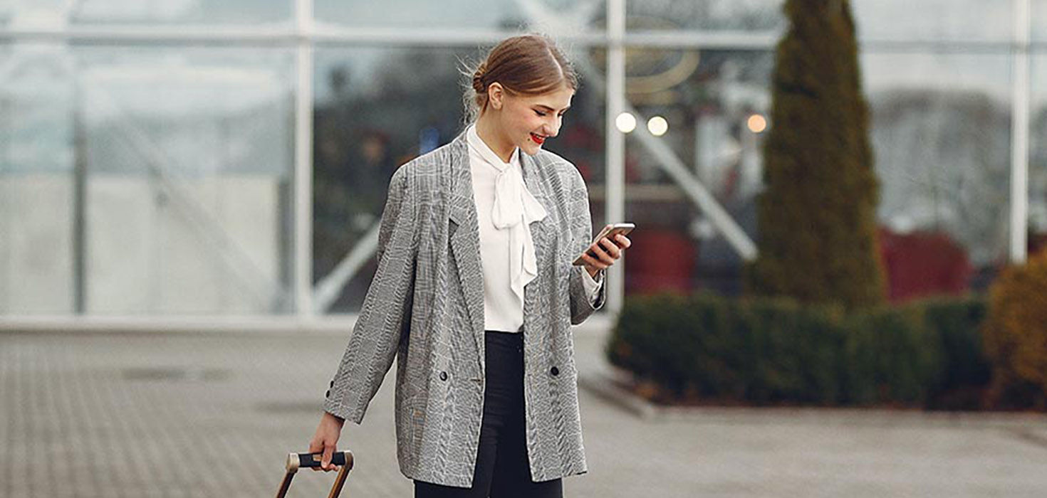 Woman walking with suitcase